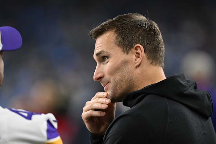 Jan 7, 2024; Detroit, Michigan, USA; Minnesota Vikings quarterback Kirk Cousins (8) talks with teammates prior to their game against the Detroit Lions at Ford Field.